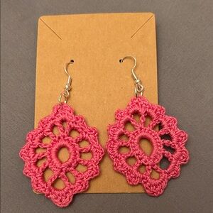 Handmade crocheted dangly earrings.